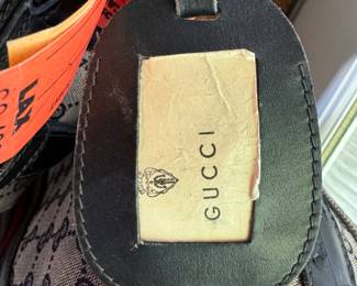 Tag of vintage Gucci suitcase