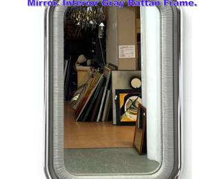 Lot 924 Post Modern Chrome Framed Wall Mirror. Interior Gray Rattan Frame.