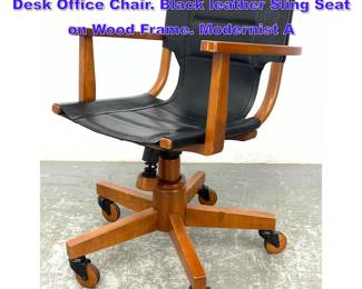 Lot 1083 ASHER BENJAMIN STUDIO Rolling Desk Office Chair. Black leather Sling Seat on Wood Frame. Modernist A