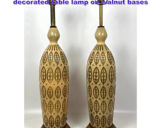 Lot 941 Pr. Glazed ceramic incised decorated table lamp on walnut bases