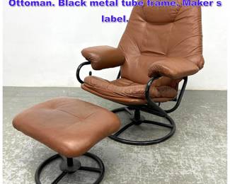 Lot 968 2pc Swivel Reclining Lounge Chair. Ottoman. Black metal tube frame. Maker s label. 