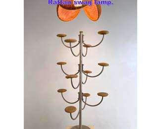 Lot 1064 2pc lot Aluminum hat stand and Rattan swag lamp.
