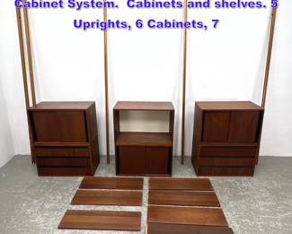 Lot 922 Mid Century Modern Omni Style Wall Cabinet System. Cabinets and shelves. 5 Uprights, 6 Cabinets, 7 
