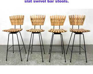 Lot 1115 Set 4 Arthur Umanoff attributed slat swivel bar stools. 