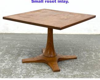 Lot 695 Walnut side table. sculpted leg. Small roset inlay. 