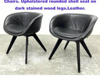 Lot 1082 Pr TOM DIXON Scoop Lounge Chairs. Upholstered rounded shell seat on dark stained wood legs.Leather.