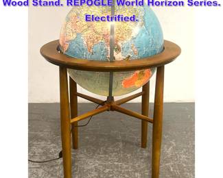 Lot 775 Light Up World Globe in Modernist Wood Stand. REPOGLE World Horizon Series. Electrified. 