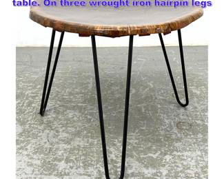 Lot 973 Studio made free form wood side table. On three wrought iron hairpin legs 