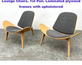 Lot 651 Pr Hans Wegner style Shell style Lounge Chairs. 1st Pair. Laminated plywood frames with upholstered 