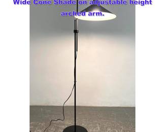 Lot 735 Modernist Black Metal Floor Lamp. Wide Cone Shade on adjustable height arched arm.