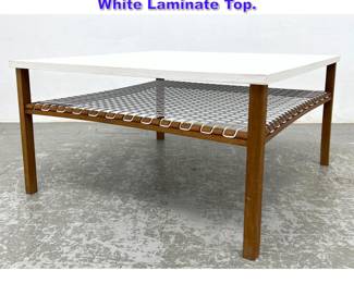 Lot 907 Georges Tigien Coffee Table with White Laminate Top. 