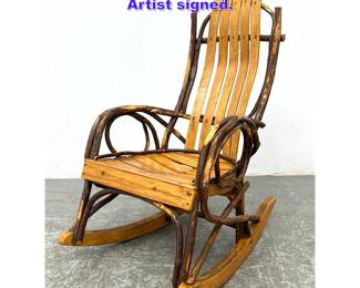 Lot 830 Child s Adirondack Twig Rocker. Artist signed.