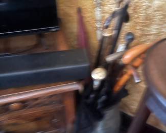 Assorted canes and umbrellas 