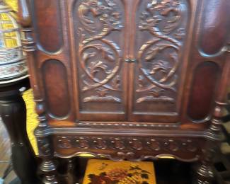 Beautiful carved bar cabinet