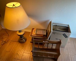 Picture Frames, Magazine Rack, And Brass Lamp