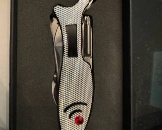 Fish shaped all purpose tool.