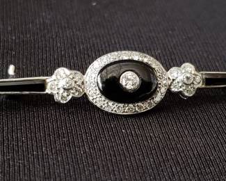 Lot # : 34 - 18k gold pin with diamonds and black onyx
