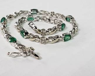 Lot # : 92 - 14k white gold bracelet w/diamonds and green
