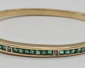 Lot # : 11 - 14k gold & diamond bracelet with green stones
