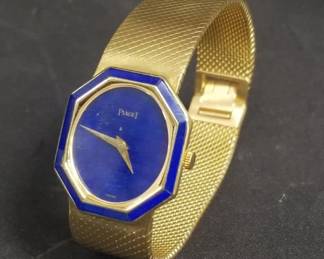 Lot # : 157 - Piaget 18k gold wristwatch with lapis face
