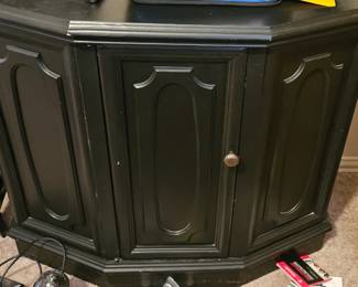 Black TV stand or entry table.