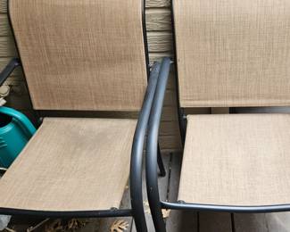 Patio chairs and lots of patio decor.