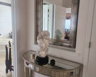 Glass Mirrored Accent Table $200, Sculpture $300, Mirror $100