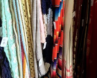 Lots of hand-made afghans and some blankets.