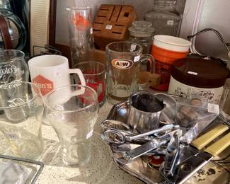 Various restaurant souvenir glasses.