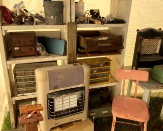 We have several rustic wooden furniture pieces, old frames, a painted metal chair, old gas heaters, folding chairs.