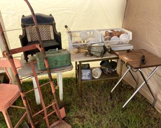 Vintage light bulbs, that folding table for slide projector, old tool/fishing boxes.