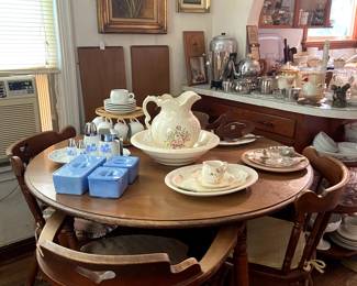 Maple dining table with 2 extra leaves and 4 chairs. Check out the blue delphite refrigerator dishes!