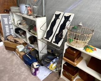 More great old wooden and metal shelving. Lots of old fishing boxes-some full.