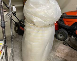 Roll of yellow and white stripe terry cloth  
Approximately 85 feet long 
48”-54” wide