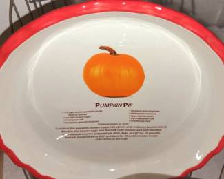 Much kitchenware.  Pumpkin pie recipe dish