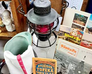 Much vintage railroad collectibles.  "Atchison, Topeka and Sante Fe" and "Santa Fe" items