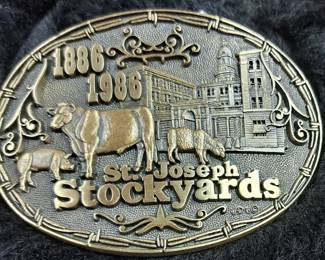 "St. Joseph Stockyards 1886-1986" belt buckle. Thank you again for attending our sales, we do appreciate it. Randy and Donna Klein and The Pen and Pencil Team