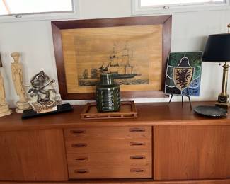 H.P. Hansen mid-century side board.. .Emperor  & Empress pair.. Chinese Roof Tile Warrior...Palshus mid-century pottery-large ship print on wooden frame...antique stain glass