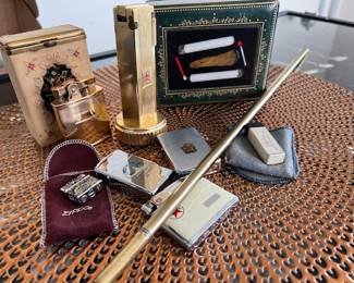 Collection of vintage lighters :Zippo, Canary Wind Up Musical, Caltex, brass grill lighter, Cygnus, Miniature Electric Heater, etc  Vintage cigarette holder, Rare Pietra Dura Box