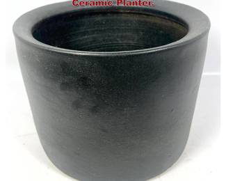 Lot 1544 Mid Century Modern Black Glazed Ceramic Planter.