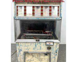 Lot 1317 Vintage AMI Music JukeBox Record Player. Only has a few records.