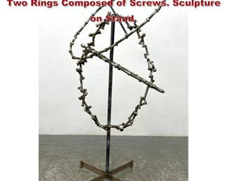 Lot 1507 Welded Screws Brutalist Sculpture. Two Rings Composed of Screws. Sculpture on Stand. 