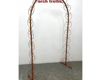 Lot 1506 Whimsical wrought iron arch trellis. 