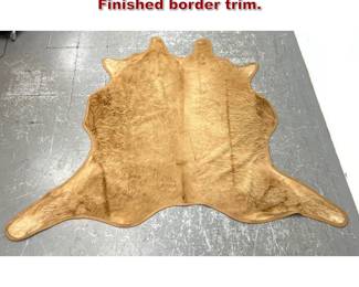 Lot 1304 Calf Skin Natural Hide Rug. Finished border trim. 