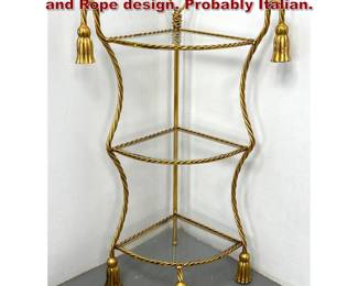 Lot 1642 Gilt Iron Corner Shelf with tassels and Rope design. Probably Italian. 