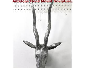 Lot 1413 Metal Figural Wall Sculpture. Faux Antelope Head Mount Sculpture. 