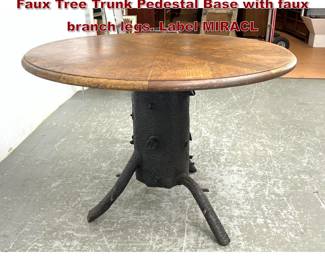 Lot 1641 Faux Bois Metal Base Dining Table. Faux Tree Trunk Pedestal Base with faux branch legs. Label MIRACL