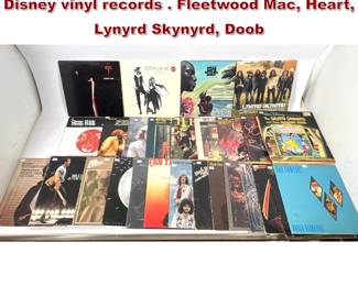 Lot 1671 Lot of 32 mostly classic rock some Disney vinyl records . Fleetwood Mac, Heart, Lynyrd Skynyrd, Doob