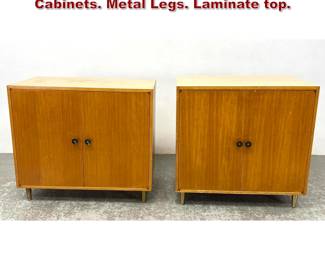 Lot 1352 Pair American Modern Server Cabinets. Metal Legs. Laminate top. 