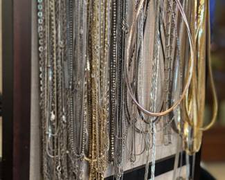 Dozens of sterling chains, dozens of pendants in different pictures